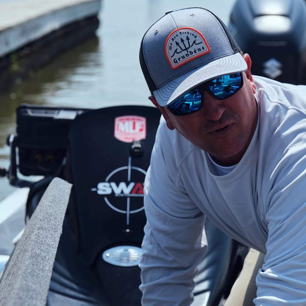 grundens_poseidon_trucker_hat_heather_grey_black_lifestyle