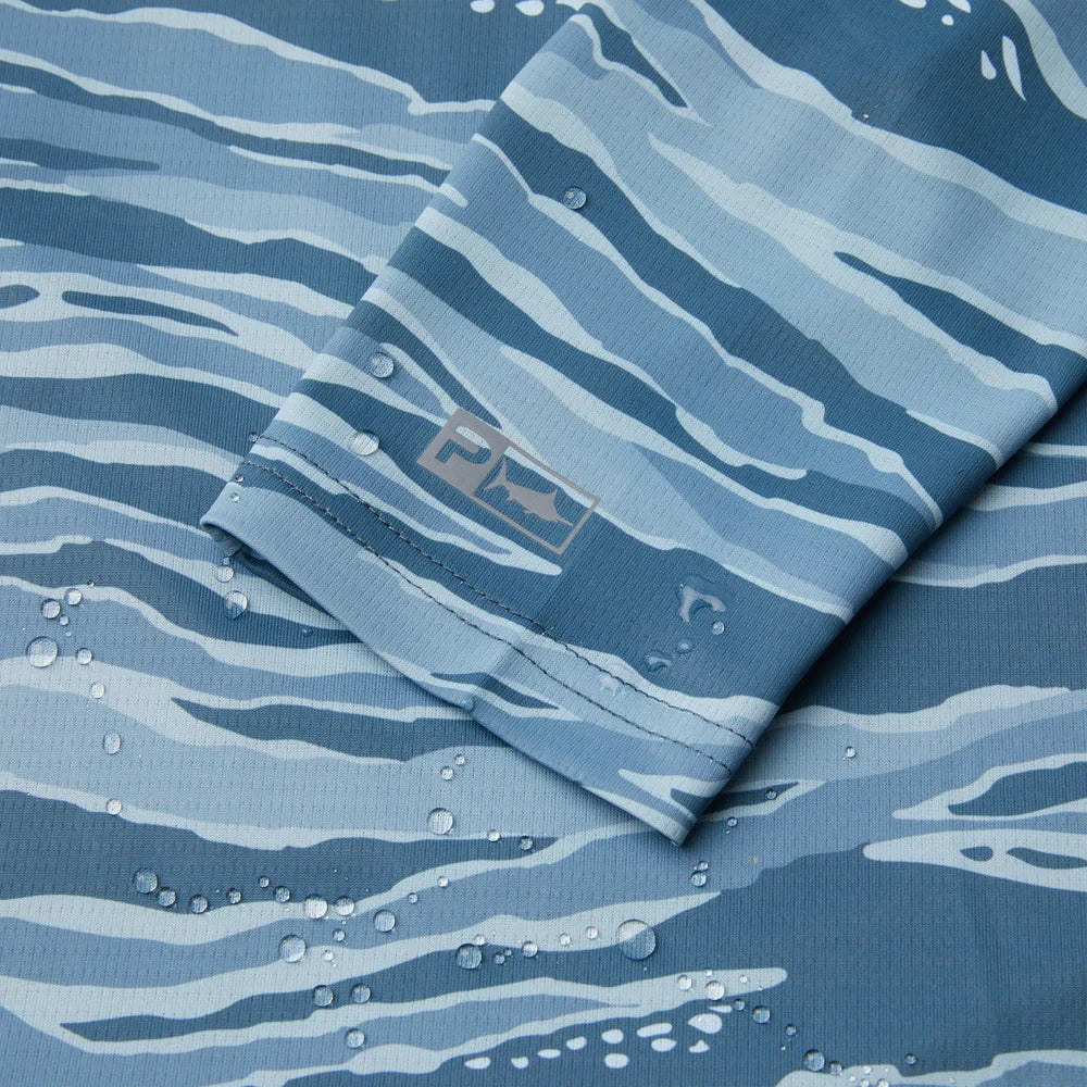 pelagic-exo-tech-hooded-performance-fishing-shirt-petrol-wahoo-camo-sleeve