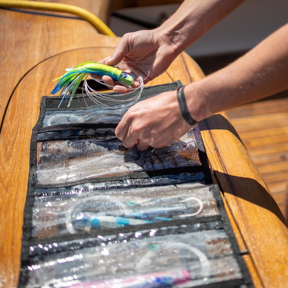 fathom-offshore-medium-lure-roll-up-bag-6-pocket-lifestyle